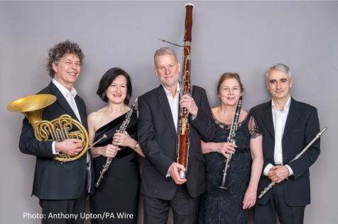 A group of musicians with their instruments.